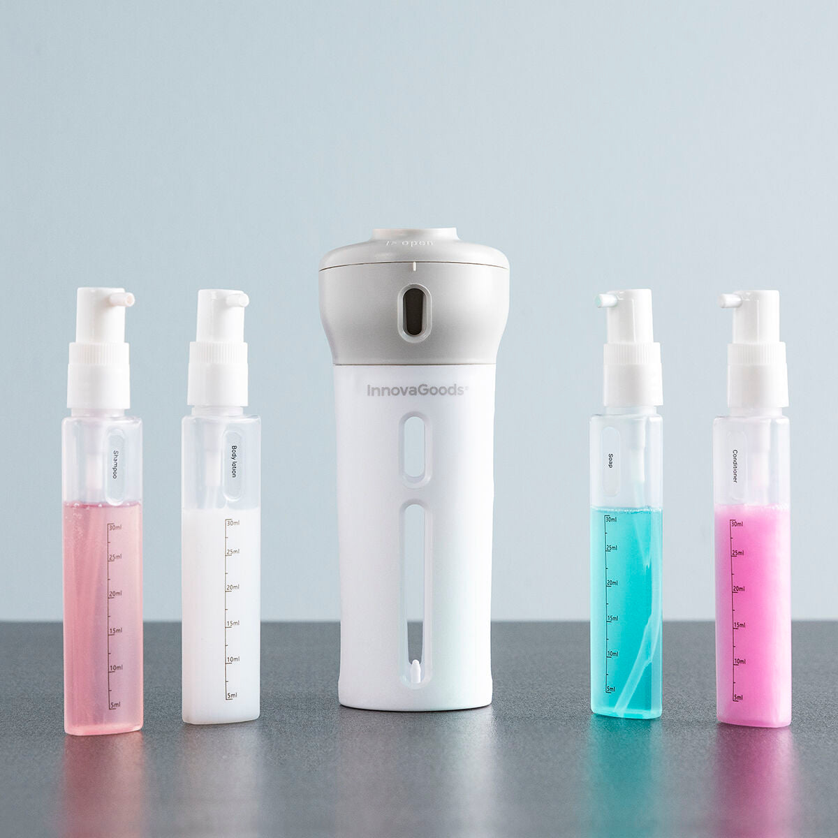 4-in-1 nesteiden matka-annostelija Fordrops InnovaGoods